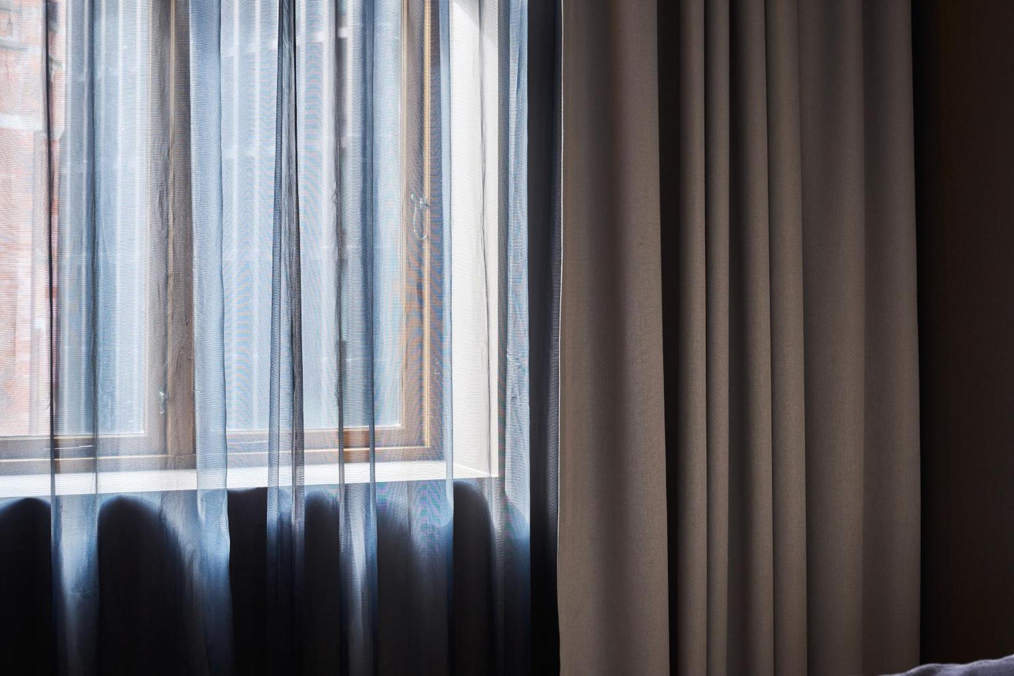 Opus 16 Hotel Bergen Exterior photo Window curtains