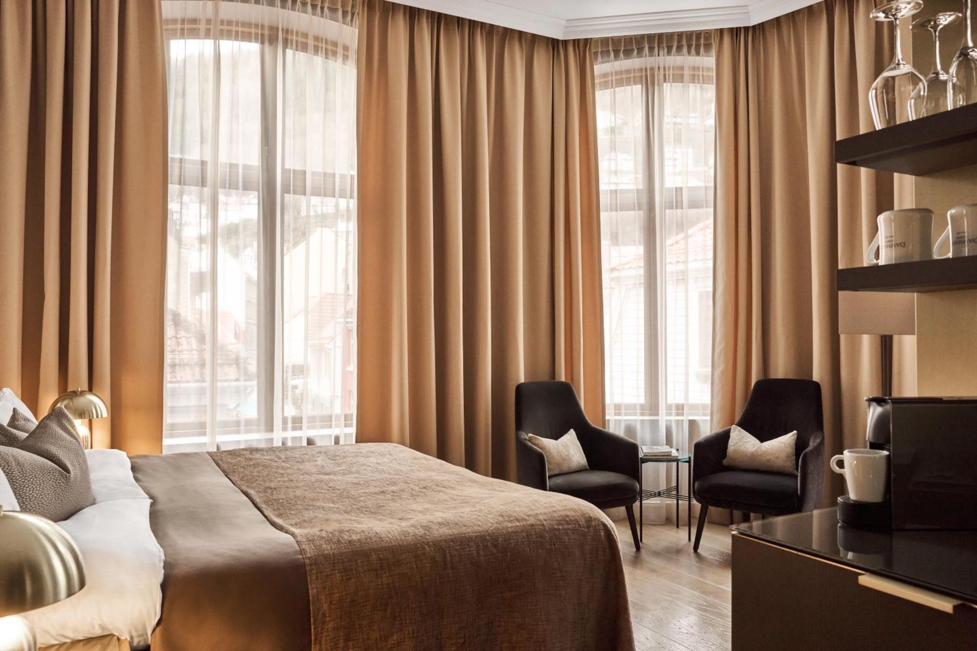 Opus 16 Hotel Bergen Exterior photo Curtains in a bedroom