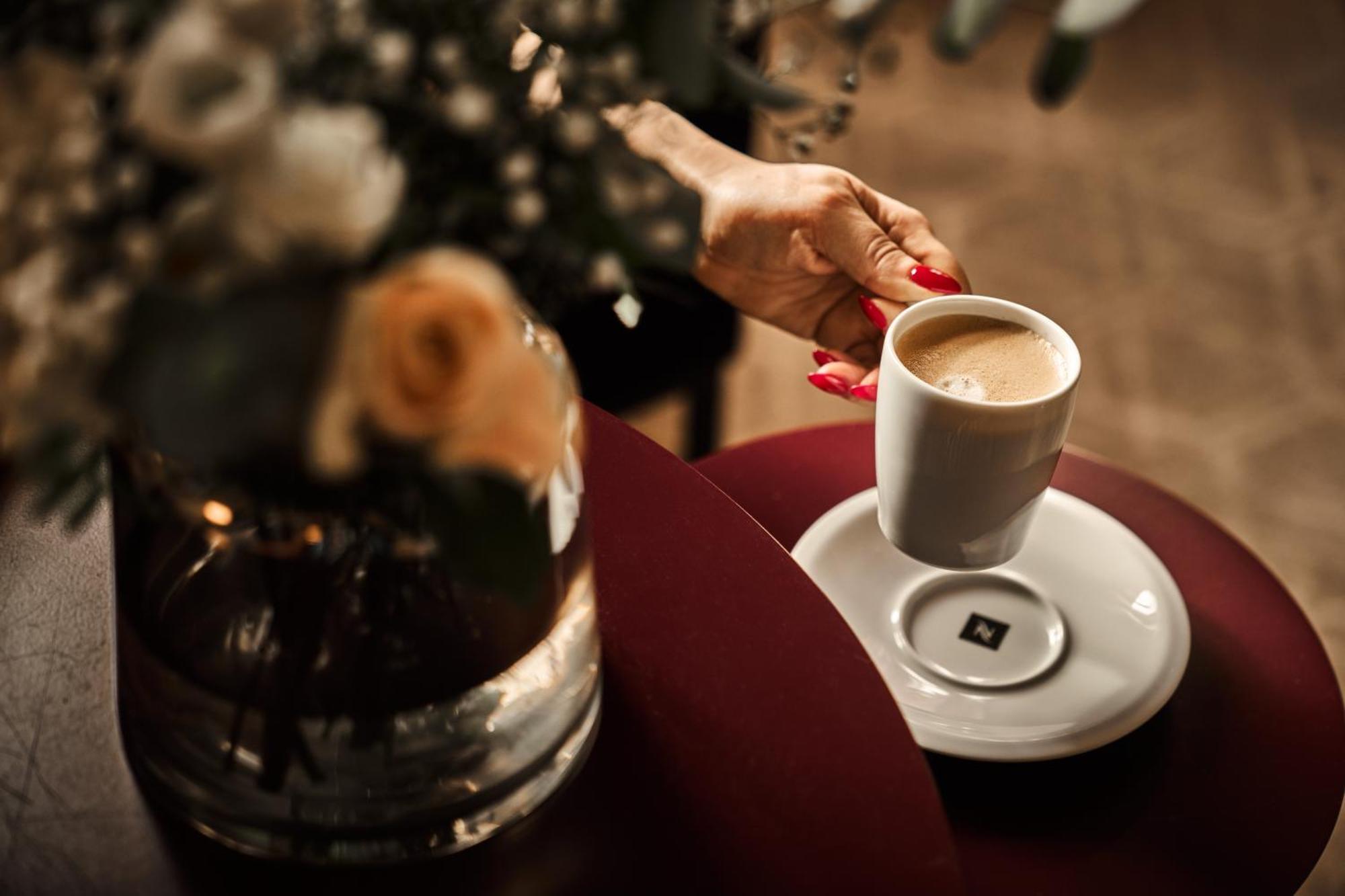 Opus 16 Hotel Bergen Exterior photo A cup of coffee